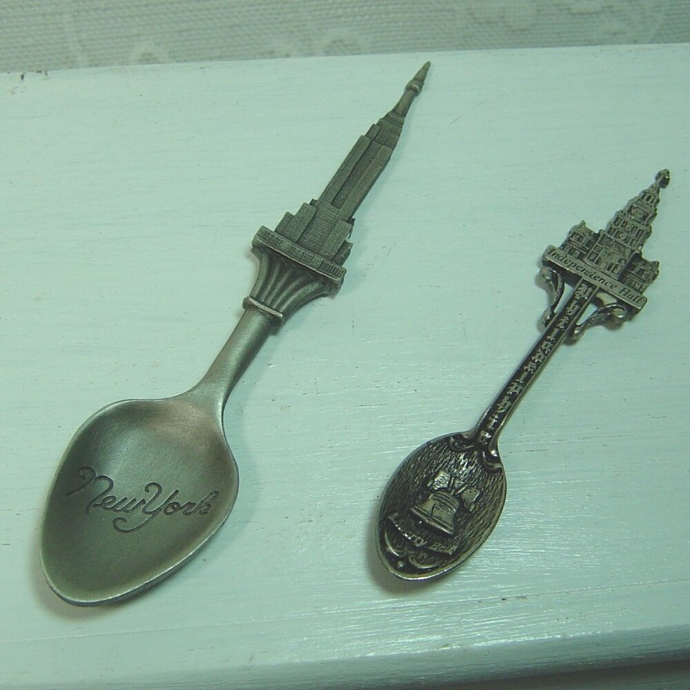 2 pewter colored souvenir spoons--New York & Philadelphia